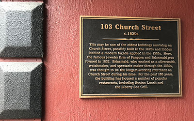 Historic plaque at 103 - 105 Church Street